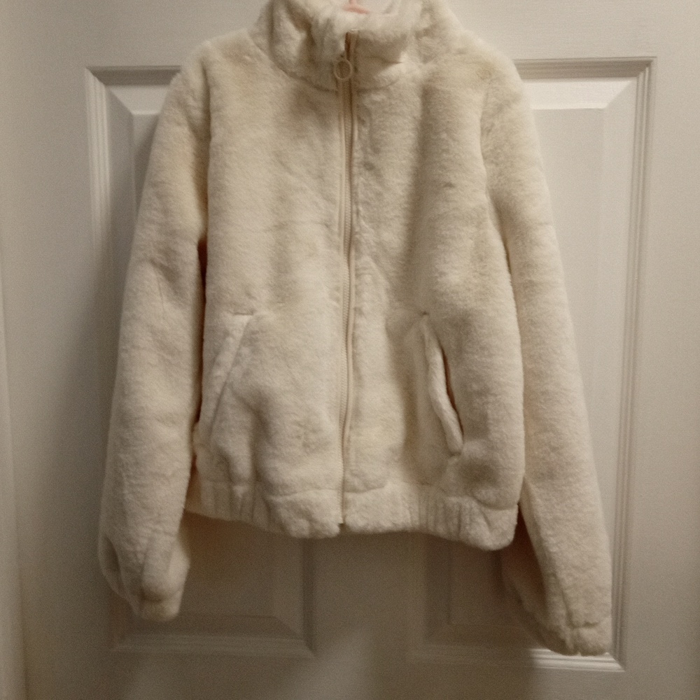 So girls cram color faux fur jacket. New. Size 8 .